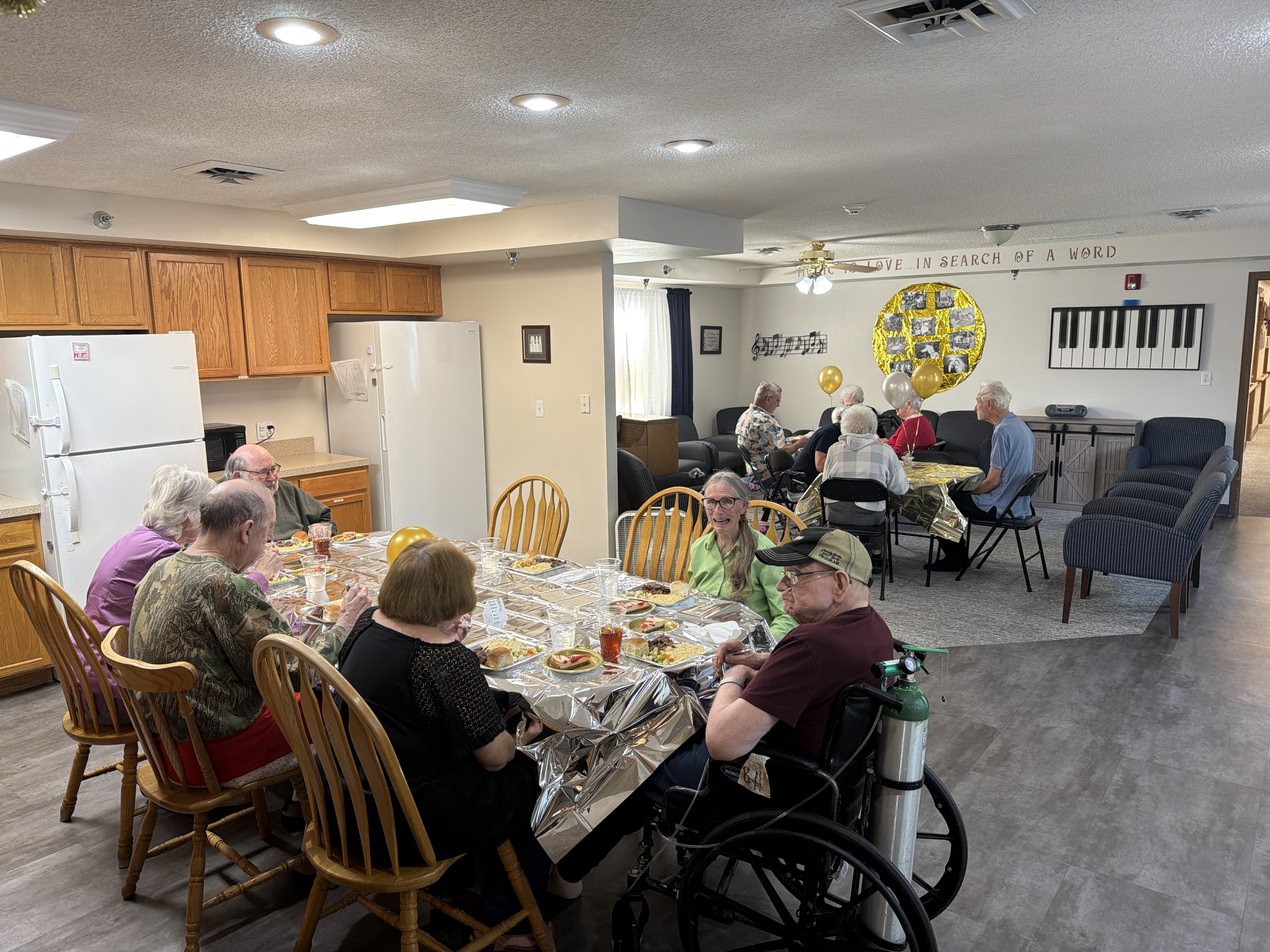Residents sharing a meal in the dining room